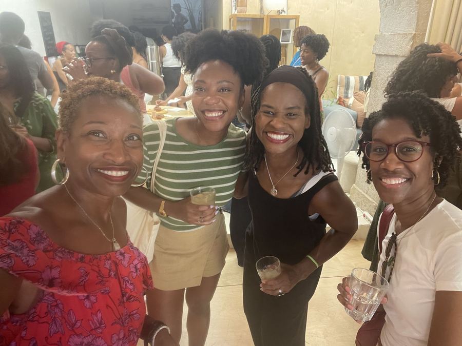 Members laughing together at a social